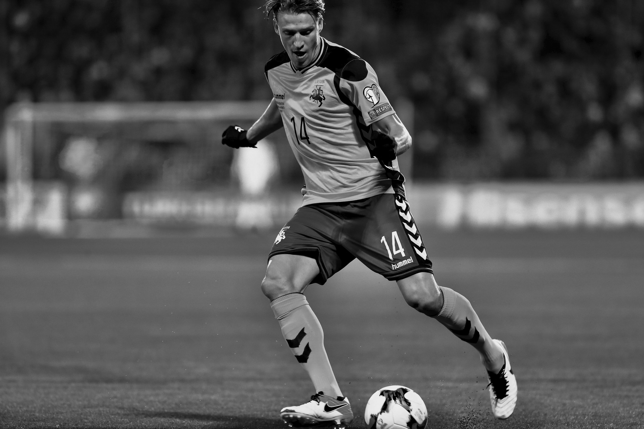 Lithuanian national-team football player controlling the ball